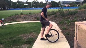 Riding a unicycle 